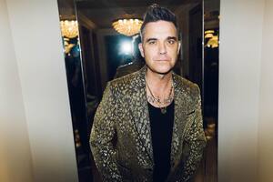 El impensado cambio de look de Robbie Williams