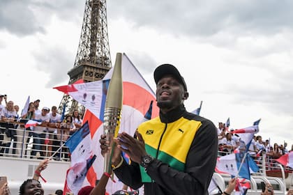 El jamaiquino Usain Bolt participó del evento que se realizó en París a falta de un año del inicio