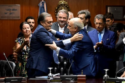 El juez Alberto Lugones y Ricardo Recondo, también consejero pero por la lista Bordó, la más crítica del kirchnerismo