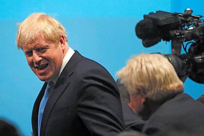 El legislador británico Boris Johnson llega para el anuncio del nuevo líder del Partido Conservador que se realizará en Londres, el martes 23 de julio de 2019.