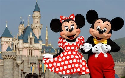 El Magic Kingdom junto con Minnie y Mickey Mouse, los íconos de este parque fundado en 1971