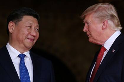 El mandatario chino, Xi Jinping, junto con Donald Trump