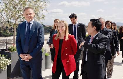 El ministro de Agricultura Francesco Lollobrigida junto a la primera ministra Giorgia Meloni