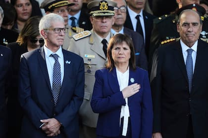 El ministro de Justicia, Mariano Cuneo Libarona, la ministra de Seguridad, Patricia Bullrich, y el jefe de Gabinete, Guillermo Francos. Natacha Pisarenko - AP