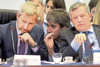 Rogelio Frigerio y Emilio Monzó