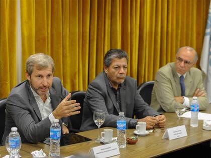 El ministro Frigerio, ayer, con Gerardo Martínez y el empresario Juan Chediack