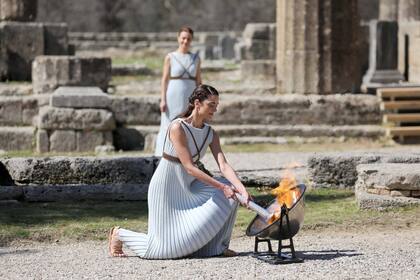 El momento del encendido de la llama olímpica