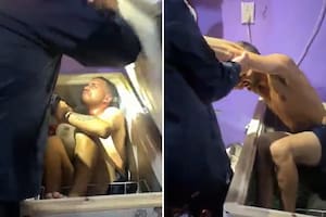 Lo buscaban por robo y la policía lo encontró dentro de un freezer con signos de hipotermia