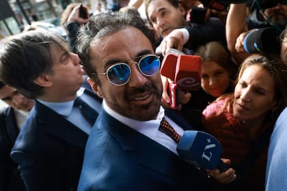 El neurocirujano Leopoldo Luque al llegar a los tribunales de San Isidro