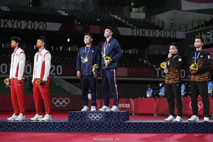 El podio de dobles masculino de bádminton tuvo a representantes de China y de Taiwán (China Taipéi)