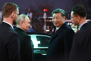 El presidente de China, Xi Jinping, y su homólogo ruso, Vladimir Putin, durante una visita del líder chino a Moscú