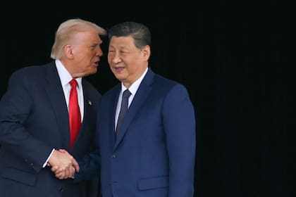 El presidente de Estados Unidos Donald Trump junto a su par chino Xi Jinping