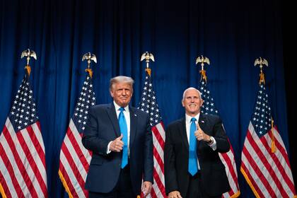 El presidente de Estados Unidos, Donald Trump, y su compañero de fórmula Mike Pence