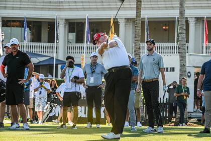 El presidente electo Donald Trump es un gran aficionado del golf (Photo by Giorgio VIERA / AFP)