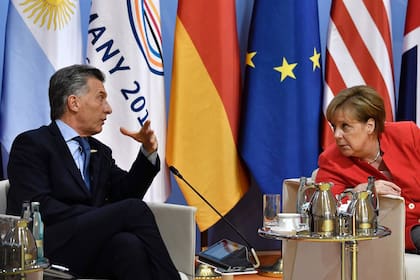 Macri con la canciller alemana, Angela Merkel, en el foro 2017 realizado en el país europeo