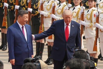 El presidente norteamericano camina junto al líder chino