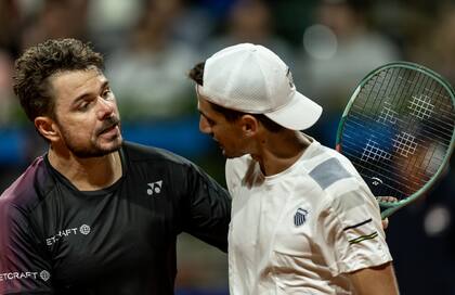 El saludo en la red entre Wawrinka y Cachin