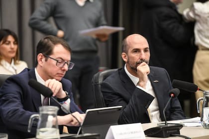 El secretario de Hacienda, Carlos Guberman, y el exvicejefe de Gabinete, José Rolandi. El dúo se desarmó tras la salida del último del Gobierno.