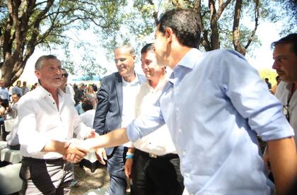 Elbio Laucirica y Eduardo Wado De Pedro, ministro del Interior