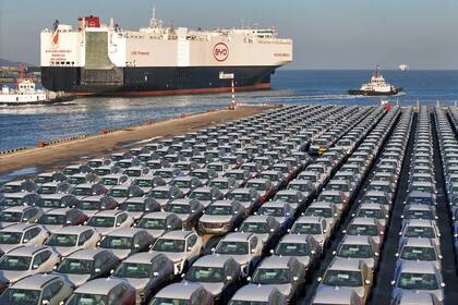 Electric cars for export waiting to be loaded on a cargo ship at a port in eastern China in January. BYD