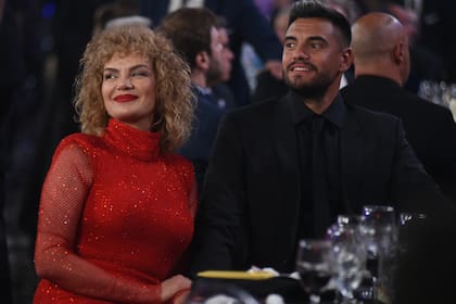 Eliana Guercio y su marido, de los últimos en entrar en el salón