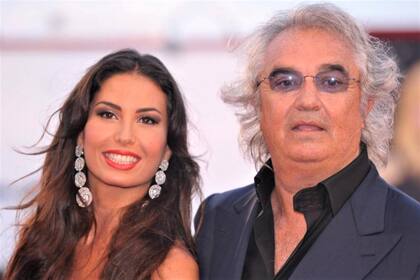 Elisabetta Gregoraci junto con Flavio Briatore, amigo de Schumacher