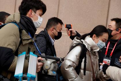 En China, el chequeo de la temperatura corporal