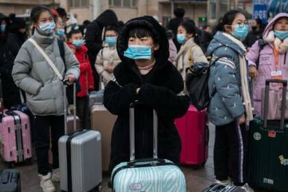 En China hay preocupación de que el virus se propague por los cientos de millones de personas que viajan para el Año Nuevo chino a finales de este mes