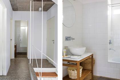 En el baño, bacha de apoyo sobre mueble con estructura de madera.