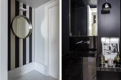En el hall del toilette, empapelado a rayas (Ferm Living) y espejo (Duveen). El interior está revestido con mármol negro, lámparas colgantes de acero (Via Luce) y fotografía de Daniel Karp sobre la mesada espejada.
