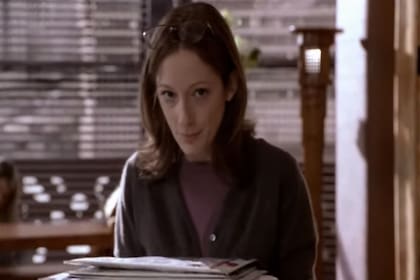 En el papel de Erin, la pasante triste clave en la película Lo que ellas quieren del año 2000