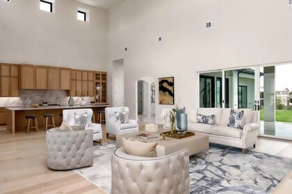 En el patio trasero se encuentra un área de descanso con chimenea, diseñada para reuniones sociales o momentos de relax