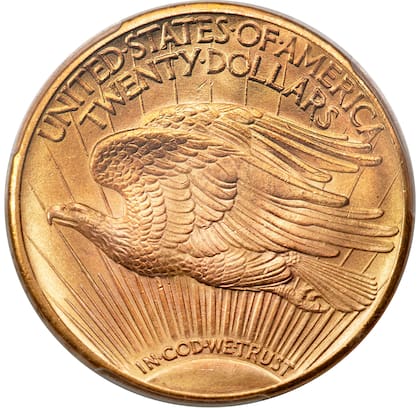 En el reverso se puede apreciar un sol creciente en la parte inferior que muestra destellos que atraviesan toda la pieza