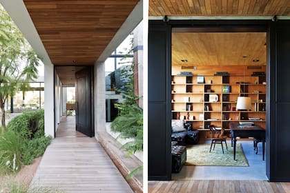 En la biblioteca que da al pasillo central, escritorio (Restoration Hardware) y sillones de cuero capitoné (Gabriel del Campo). De fondo, una biblioteca de petiribí sin lustre (Karina Kreth).