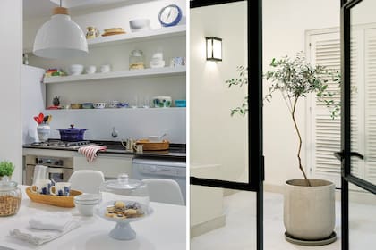 En la cocina, mesada granito negro ‘Brasil’ (Marmolería Gallus). Mueble bajomesada y estantes de madera enchapada (Estudio Ana Azzano). Lámpara colgante (Casa Rago).