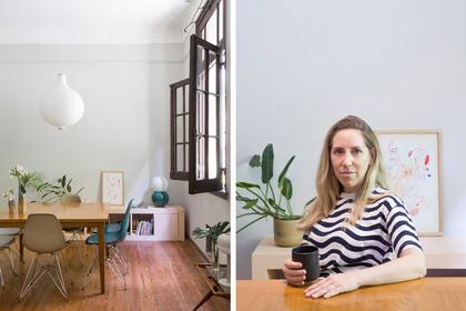 En la foto, Eugenia sentada en su comedor. Mesa con patas de madera maciza y tapa enchapada en paraíso. Sillas ‘Eames’ (Vivre Muebles).