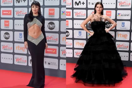 En la izquierda, Lali Esposito, la anfitriona de la noche, con un vestido con cut out en forma de diamante, en negro y plateado; En la derecha, Suárez, que lució un imponente vestido con amplia falda de tules de la firma española Yolancris