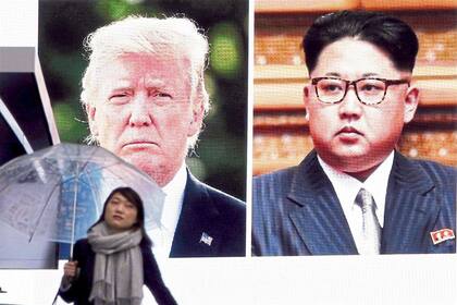 En Tokio, una pantalla gigante con las caras de Trump y Kim luego del anuncio del diálogo
