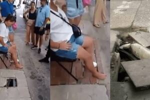 En un video se observa a la mujer, tras ser levantada por varios testigos del hecho, quienes le buscaron una silla