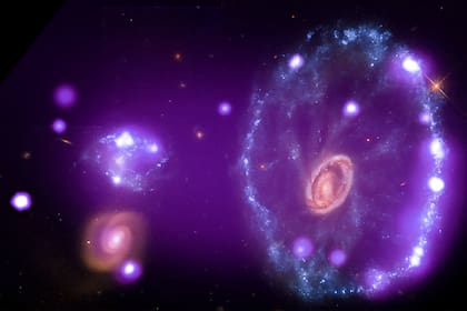 El violeta, aquí como gas caliente alojado en la galaxia Cartwheel, será el símbolo de un nuevo comienzo para las personas de Escropio