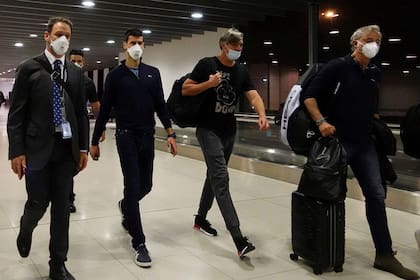 January 2022: Novak Djokovic, at Melbourne airport, along with Goran Ivanisevic, upon being expelled from Australia for not being vaccinated against Covid-19