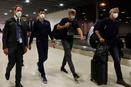 January 2022: Novak Djokovic, at Melbourne airport, along with Goran Ivanisevic, upon being expelled from Australia for not being vaccinated against Covid-19