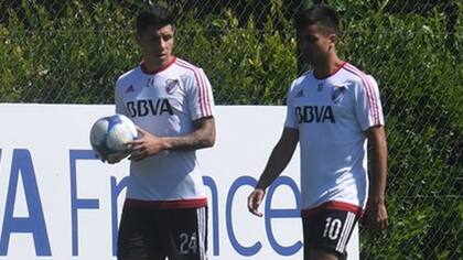 Enzo Pérez y el Pity Martínez