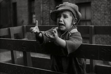 El carisma de Jackie Coogan, que tenía solo cuatro años cuando fue descubierto por Chaplin en un music hall de Los Angeles
