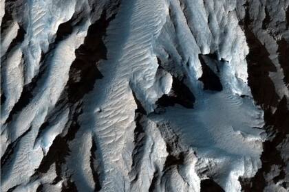 Esta es la zona de Tithonium Chasma, una parte de Valles Marineris