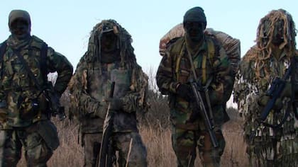 Esta foto de archivo muestra cuatro integrantes del Grupo Alacrán