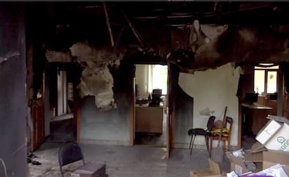 Esta imagen tomada de un vídeo muestra un edificio dañado en la región de Belgorod, Rusia, el lunes 22 de mayo de 2023.