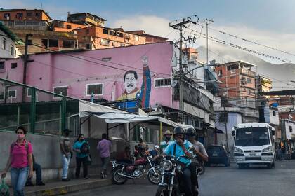Un grafiti de Maduro en Caracas