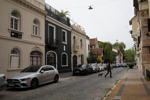 The black-painted facade sold the house this month