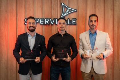 Eugenio Colusi Alan Burastero y Alberto Patron.